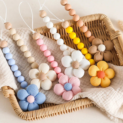 Attache tétine Bébé  en forme de fleur